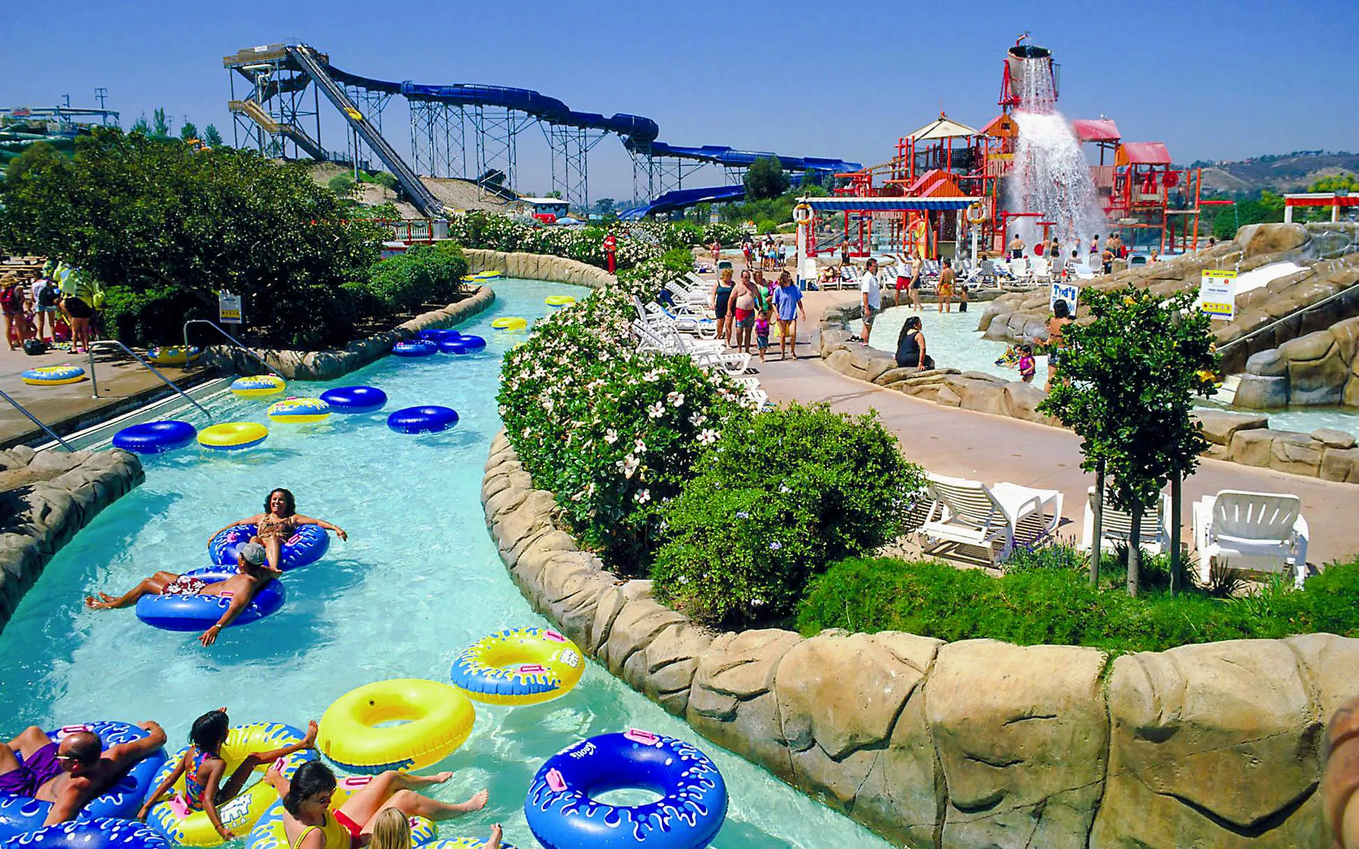 Visitors enjoying the lazy river and water slides at Knott's Soak City.
