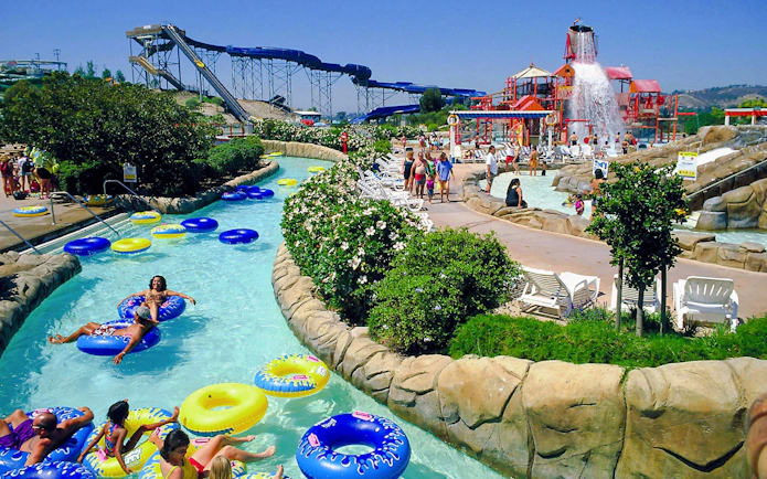 Visitors enjoying the lazy river and water slides at Knott's Soak City.