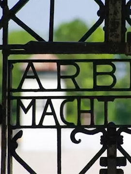 Entrance gate with "Arbeit Macht Frei" at Dachau Concentration Camp, Germany.