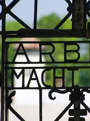 Entrance gate with "Arbeit Macht Frei" at Dachau Concentration Camp, Germany.