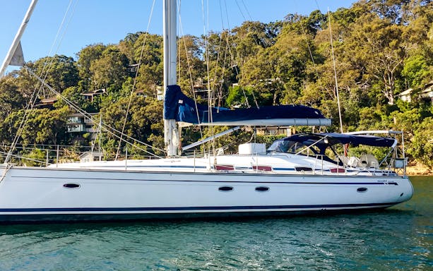 Sailing yacht on the water near La Maddalena Archipelago islands.