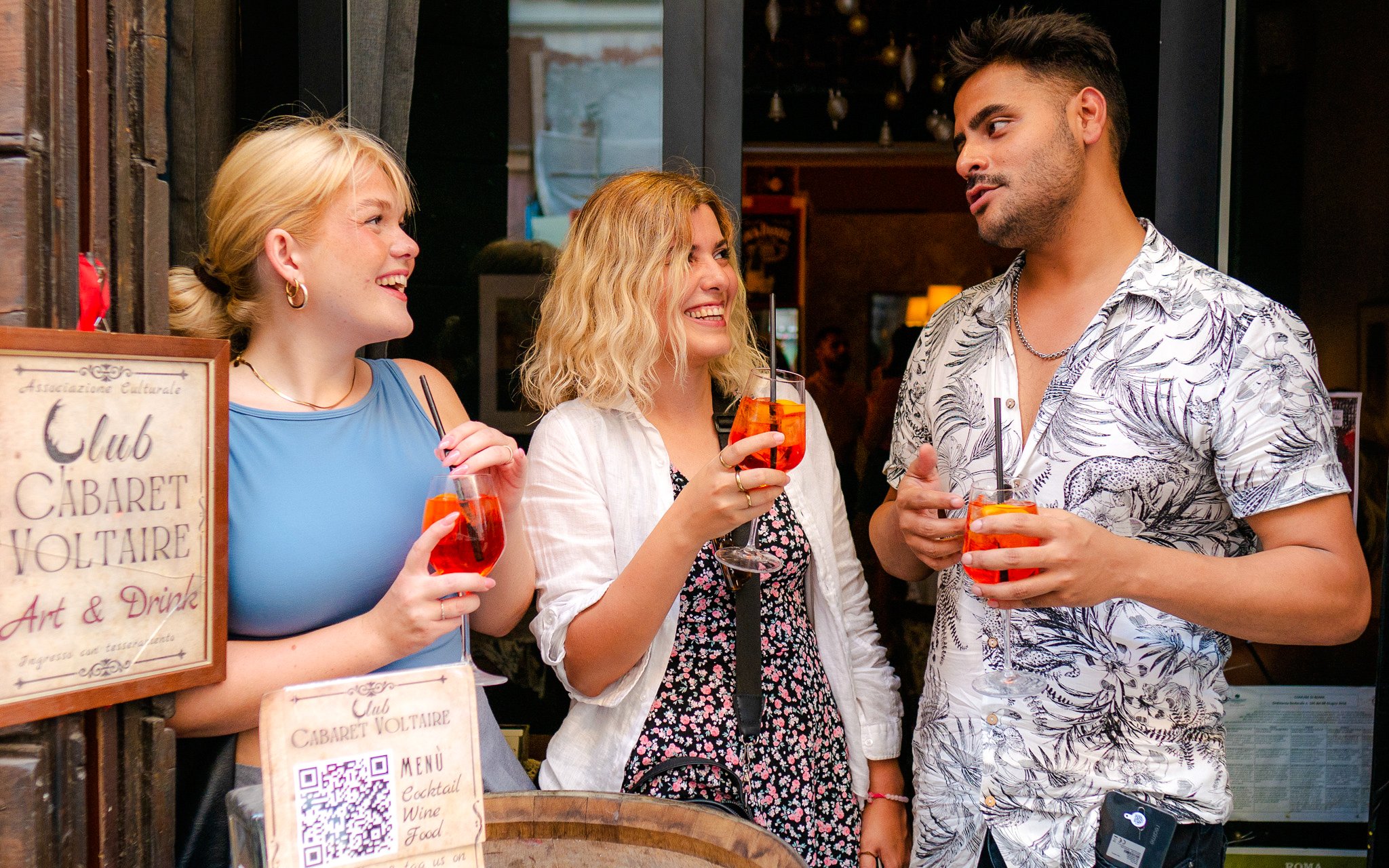Guests enjoying drinks at Club Cabaret Voltaire during the Tipsy Tour in Rome.