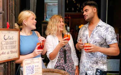 Guests enjoying drinks at Club Cabaret Voltaire during the Tipsy Tour in Rome.
