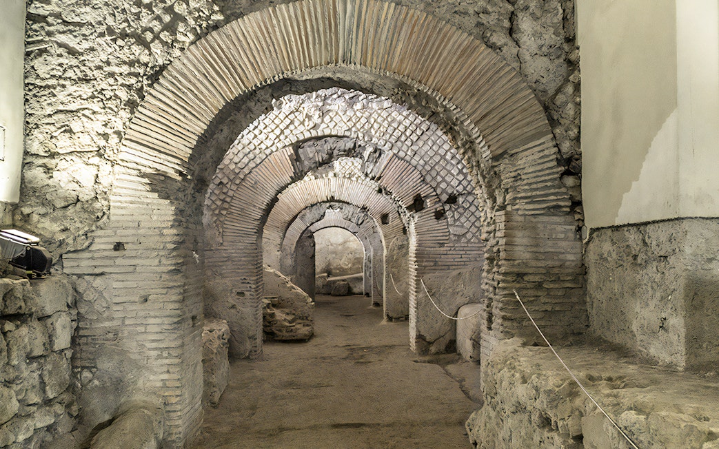 San Lorenzo Maggiore underground ruins, arched passageway, Neapolis Sotterrata, Naples, Italy.