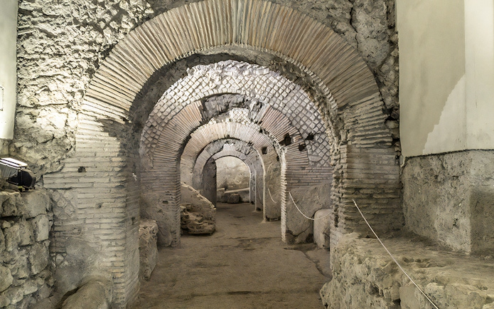 San Lorenzo Maggiore underground ruins, arched passageway, Neapolis Sotterrata, Naples, Italy.