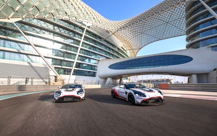 Aston Martin GT4 cars on track at Yas Marina Circuit, Abu Dhabi.