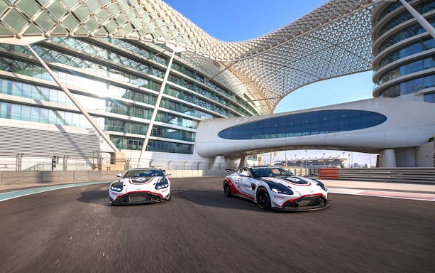 Aston Martin GT4 cars on track at Yas Marina Circuit, Abu Dhabi.