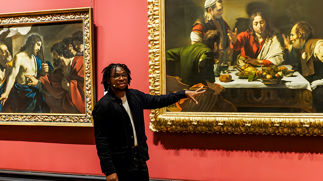Tour guide explaining paintings at the National Gallery London.