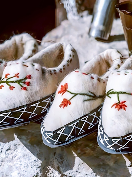 Traditional Albanian slippers with floral embroidery at Ethnographic Museum, Kruja Castle, Albania.