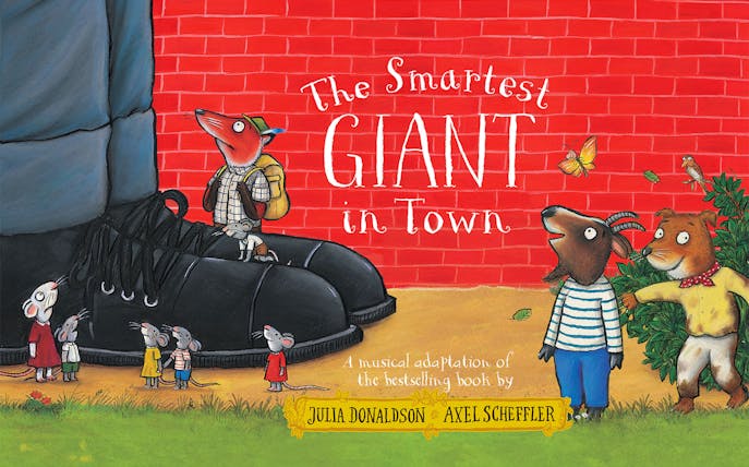 Animals gathered around giant shoes in front of a red brick wall, "The Smartest Giant in Town" text above.