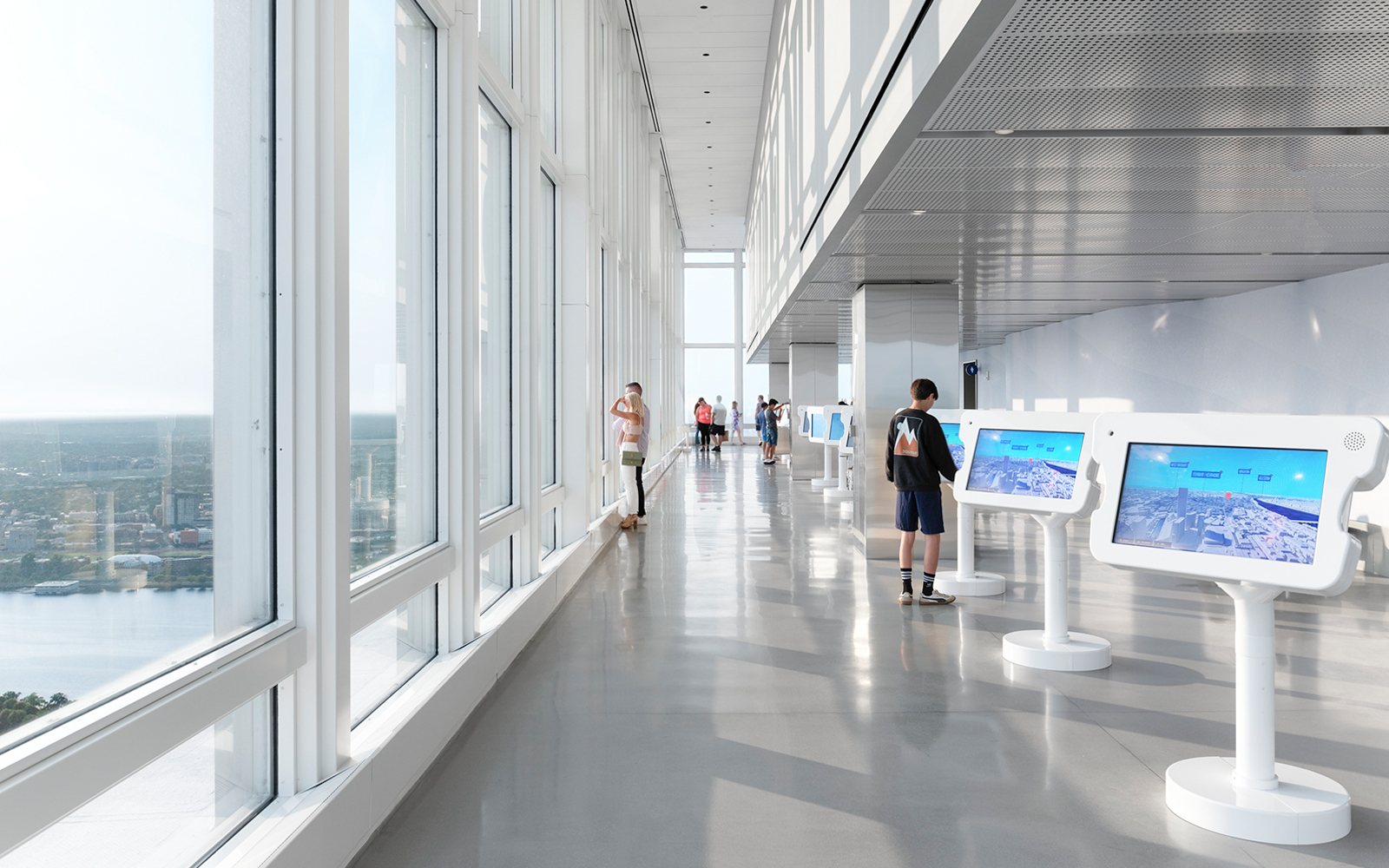 Observation deck with interactive screens and city views in Boston.