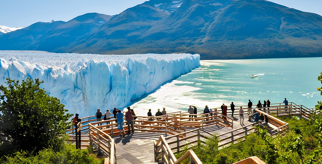 Visitors on a viewing platform overlooking Perito Moreno Glacier in Argentina.