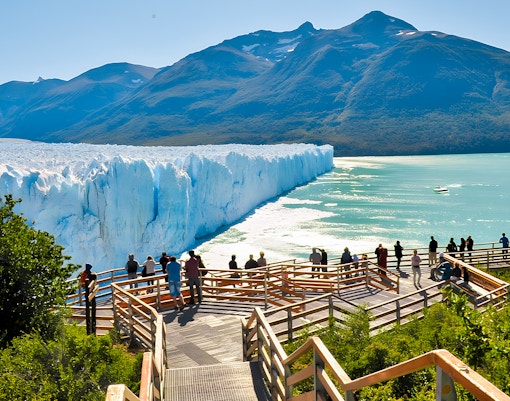Visitors on a viewing platform overlooking Perito Moreno Glacier in Argentina.
