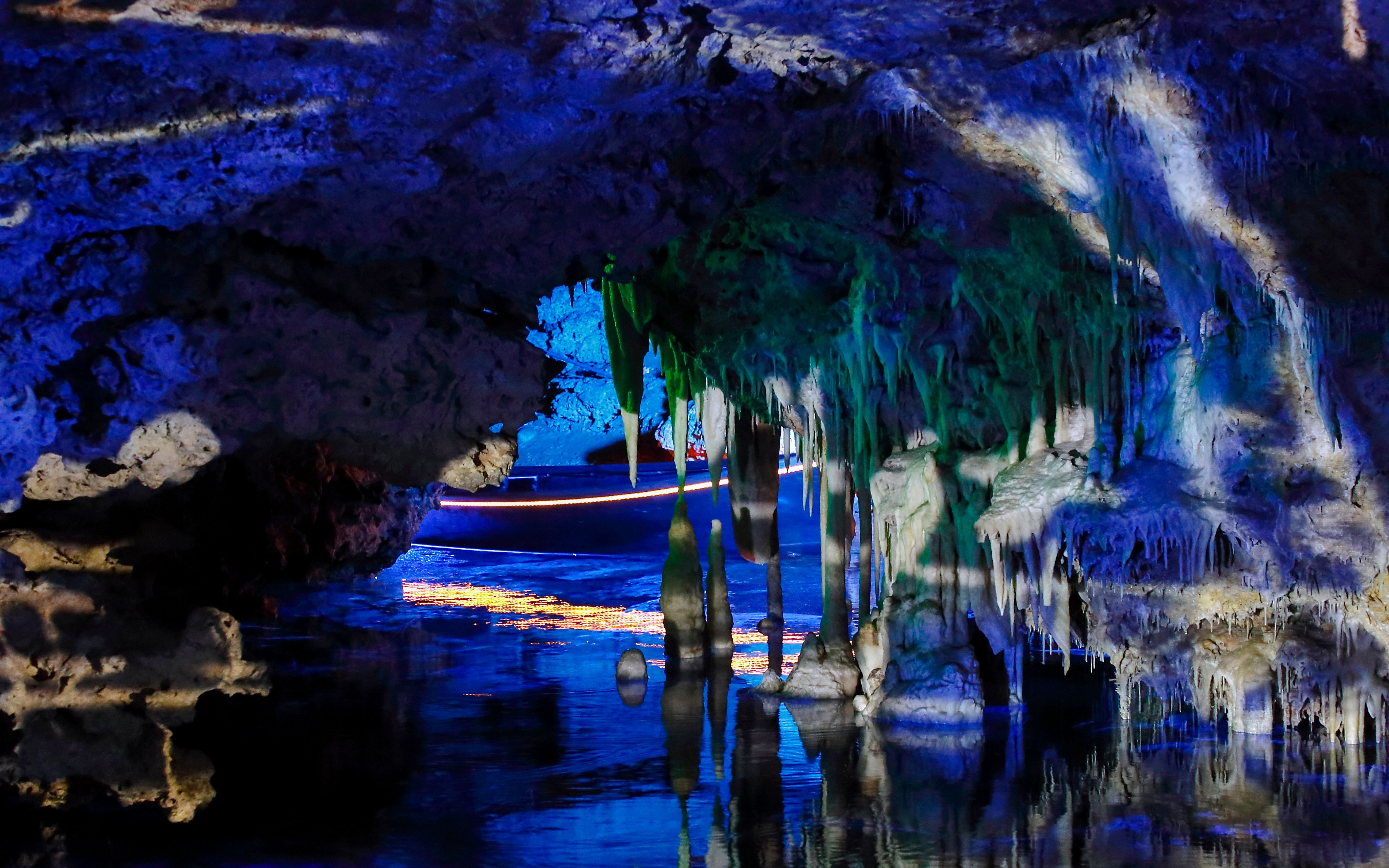 Stalactites and stalagmites in illuminated Hams Caves, Mallorca.