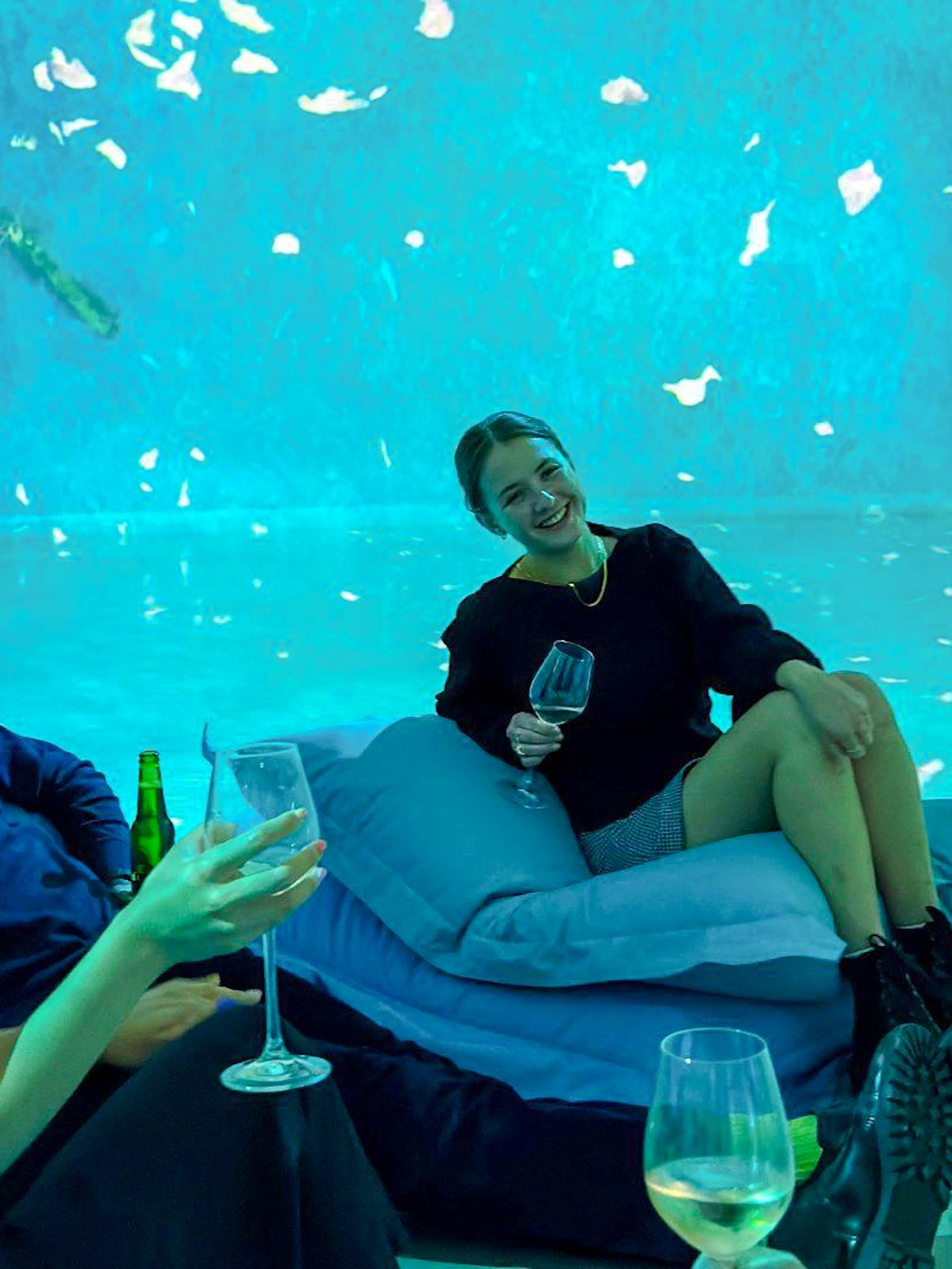 Guests enjoying drinks at Frameless Lates immersive art experience.