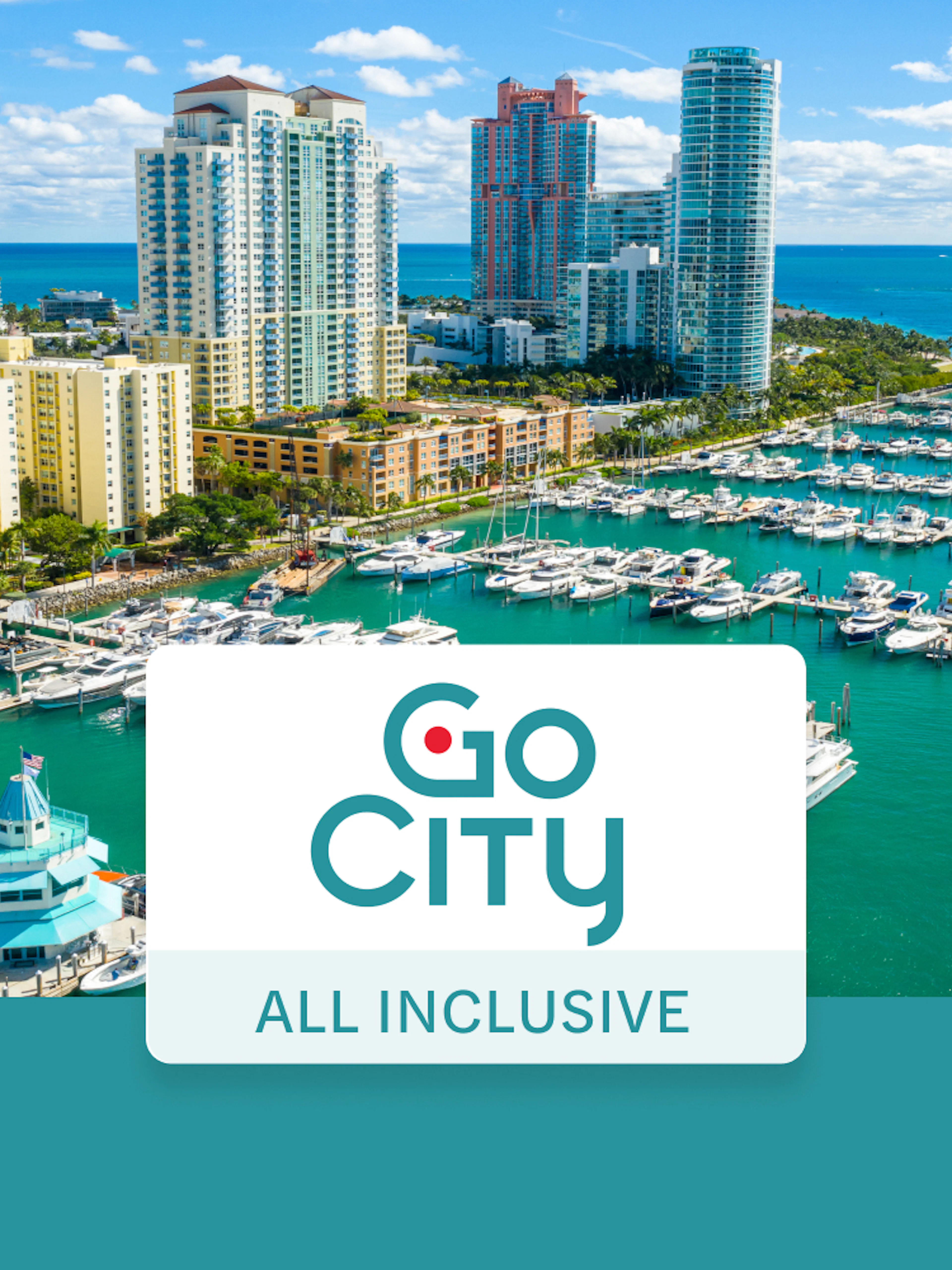 Drone view of Miami Beach marina with yachts and high-rise buildings.