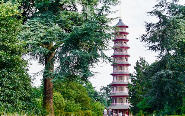 Kew Gardens Great Pagoda surrounded by lush greenery.