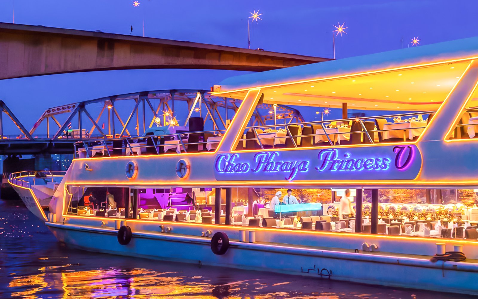 Chao Phraya Princess Cruise with buffet dinner and live music on the river at night.