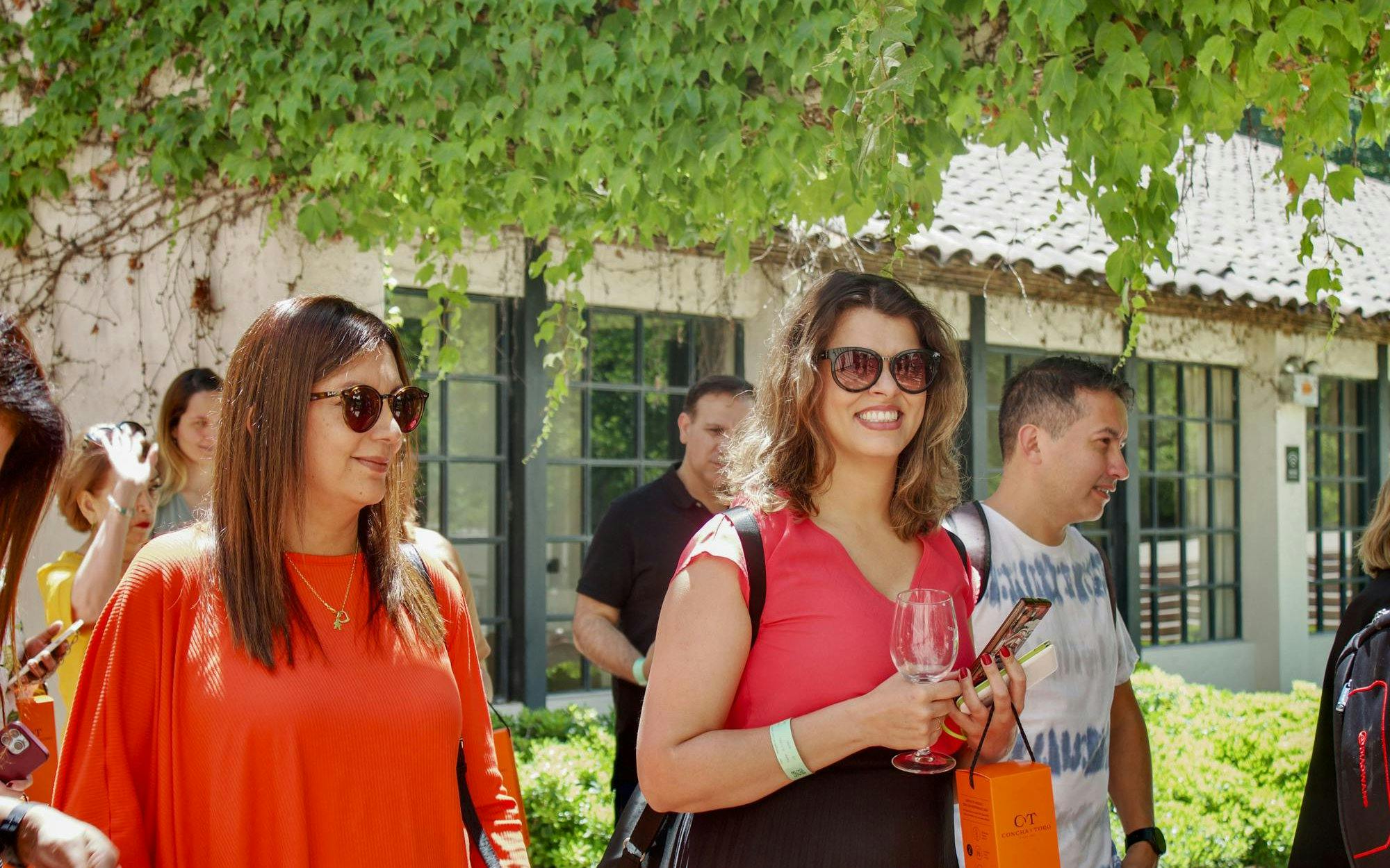 Tourist group enjoying wine tasting at Concha y Toro Winery, Chile.