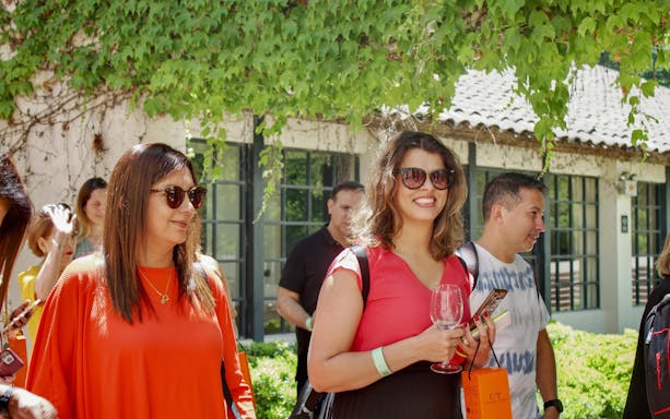 Tourist group enjoying wine tasting at Concha y Toro Winery, Chile.