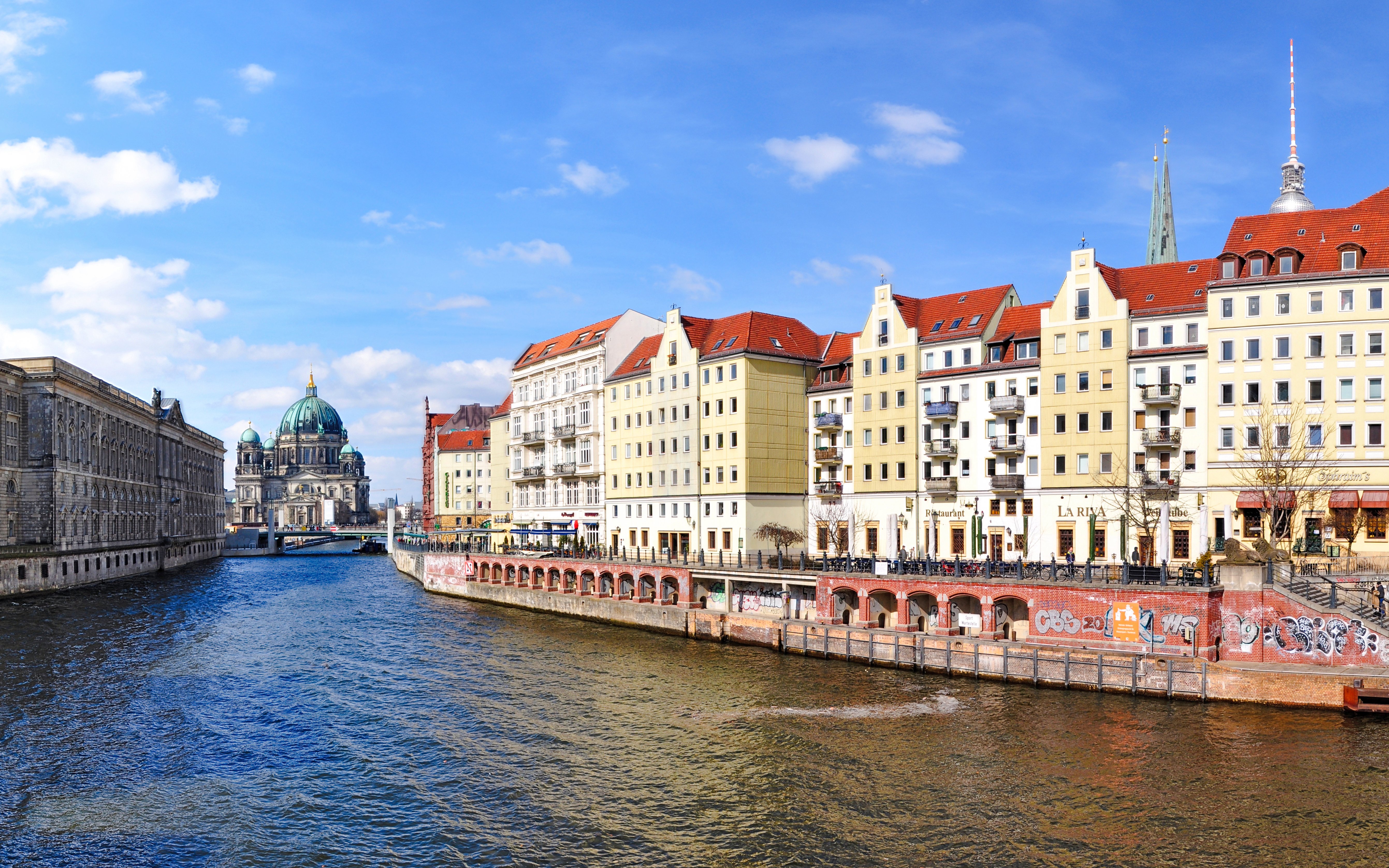Nikolaiviertel Berlin with Spree River and Berlin Cathedral in the background.