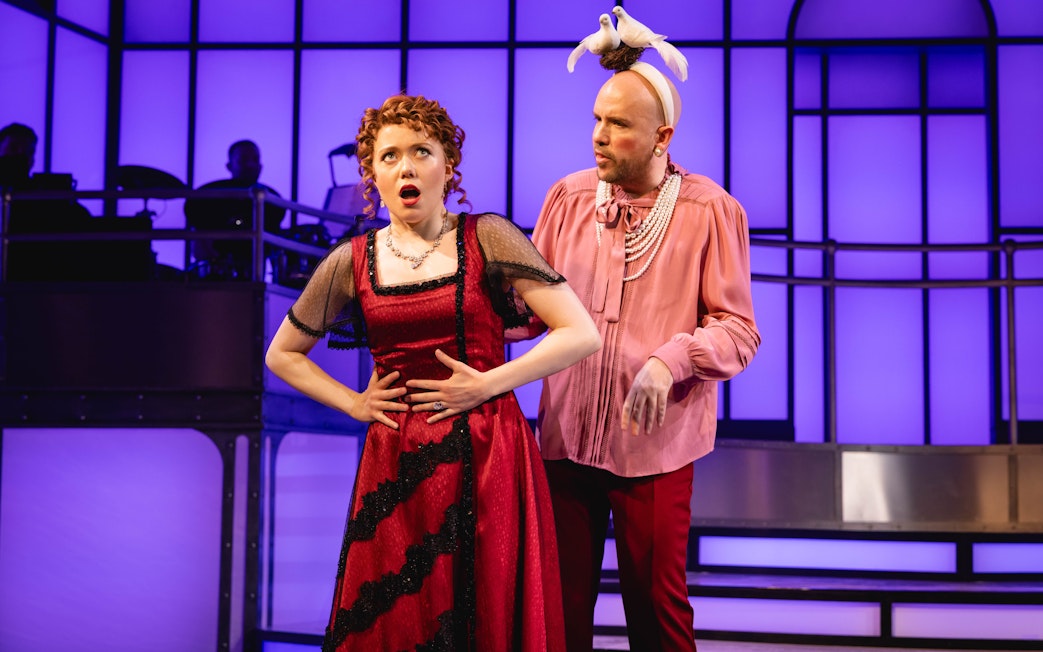 Actors performing a scene from Titanique Westend on stage.