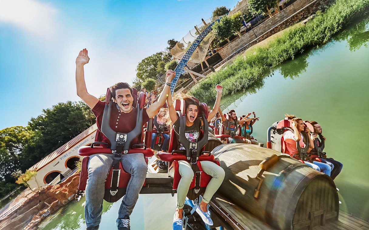 Riders enjoying Furious Baco roller coaster at PortAventura, Spain.