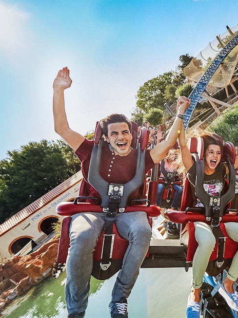 Riders enjoying Furious Baco roller coaster at PortAventura, Spain.