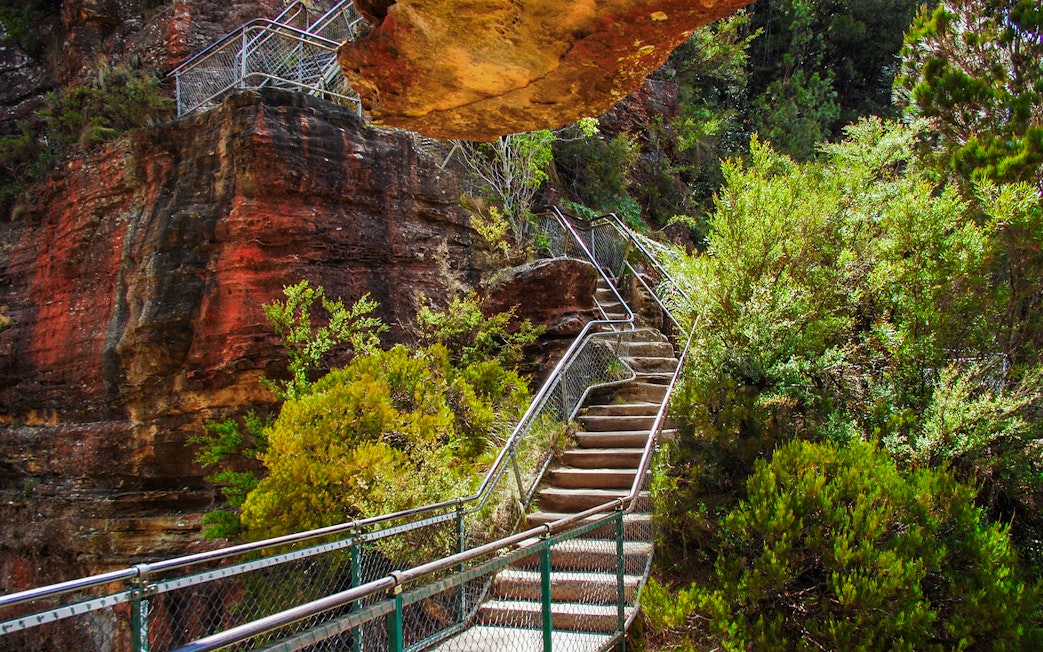 Staircase along a rocky cliff in Blue Mountains National Park, Australia.