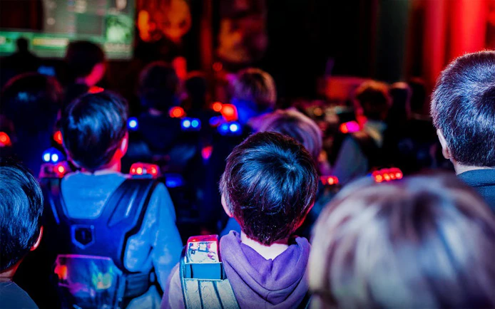 Participants in laser tag gear at Lasergame Rotterdam.