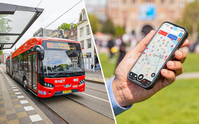 Tram in Amsterdam and a hand holding a smartphone with a city map.