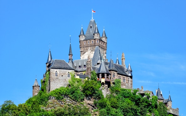 Cochem Castle on a hilltop, viewed from a 1-hour panorama cruise.