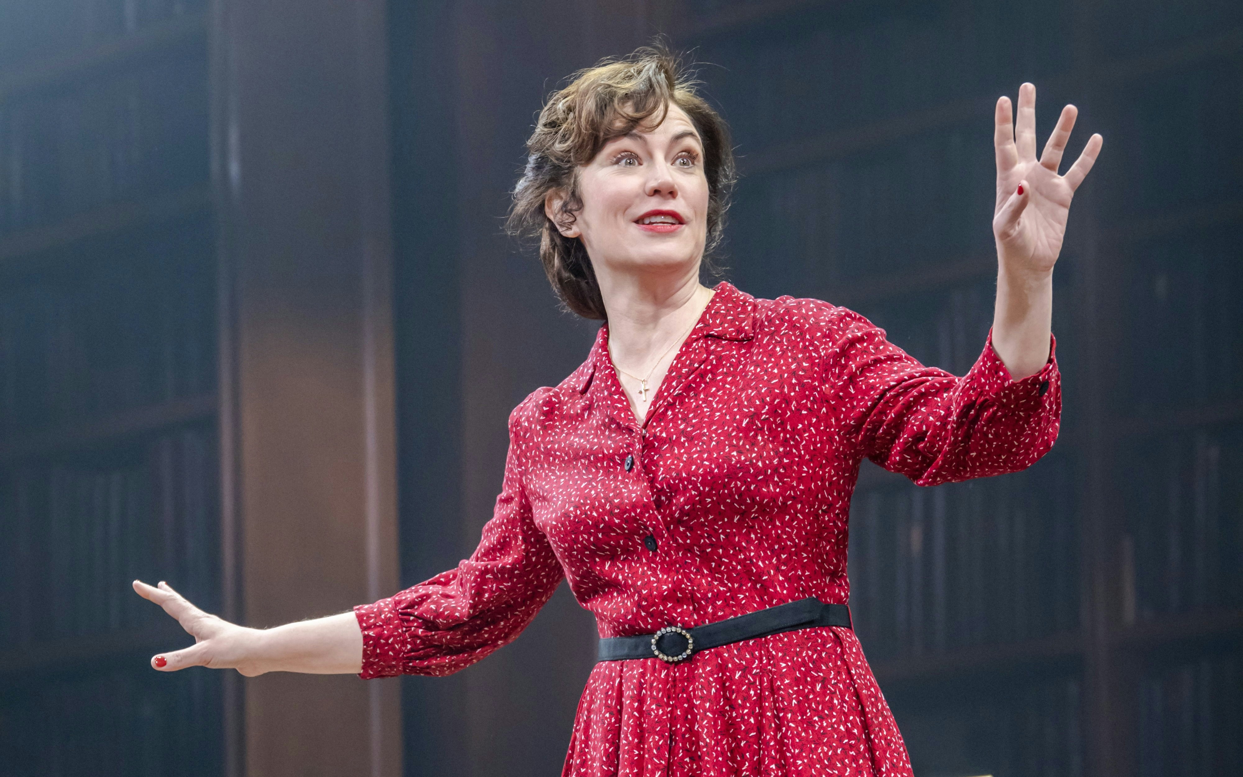 Performer in Shadowlands stage show, West End, gesturing expressively.