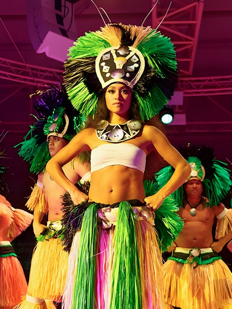 Hula dancers performing at a cultural show, Luau, Hawaii.