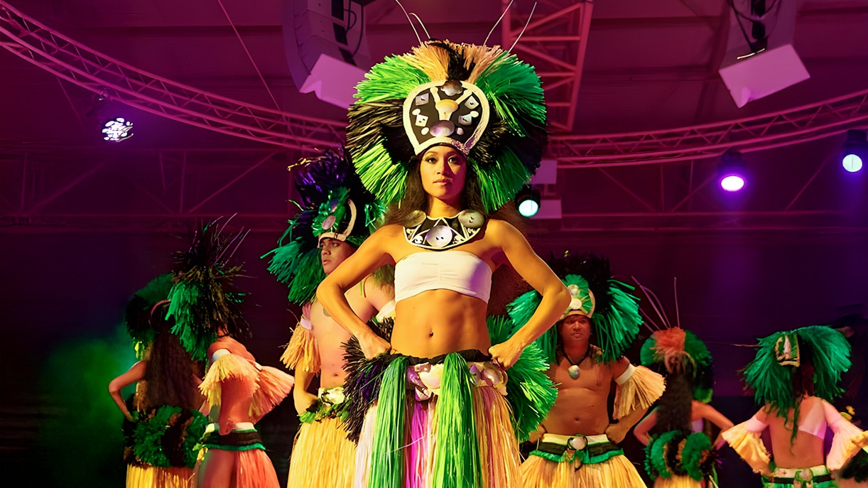 Hula dancers performing at a cultural show, Luau, Hawaii.