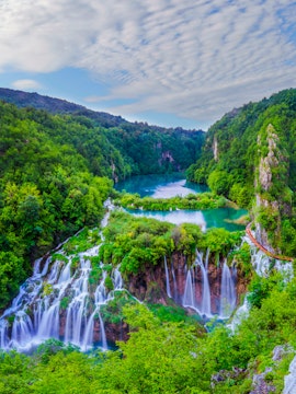 Waterfalls and lush greenery at Plitvice Lakes National Park, Croatia.
