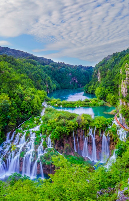 Waterfalls and lush greenery at Plitvice Lakes National Park, Croatia.
