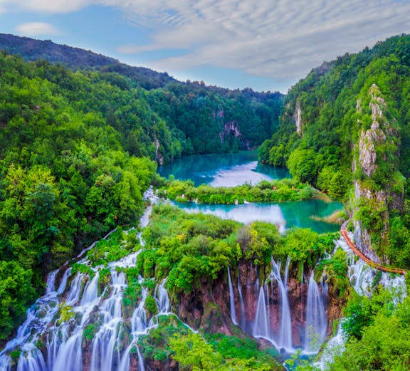 Waterfalls and lush greenery at Plitvice Lakes National Park, Croatia.