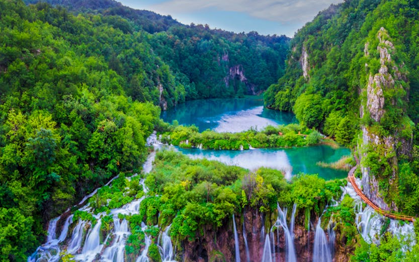 Waterfalls and lush greenery at Plitvice Lakes National Park, Croatia.