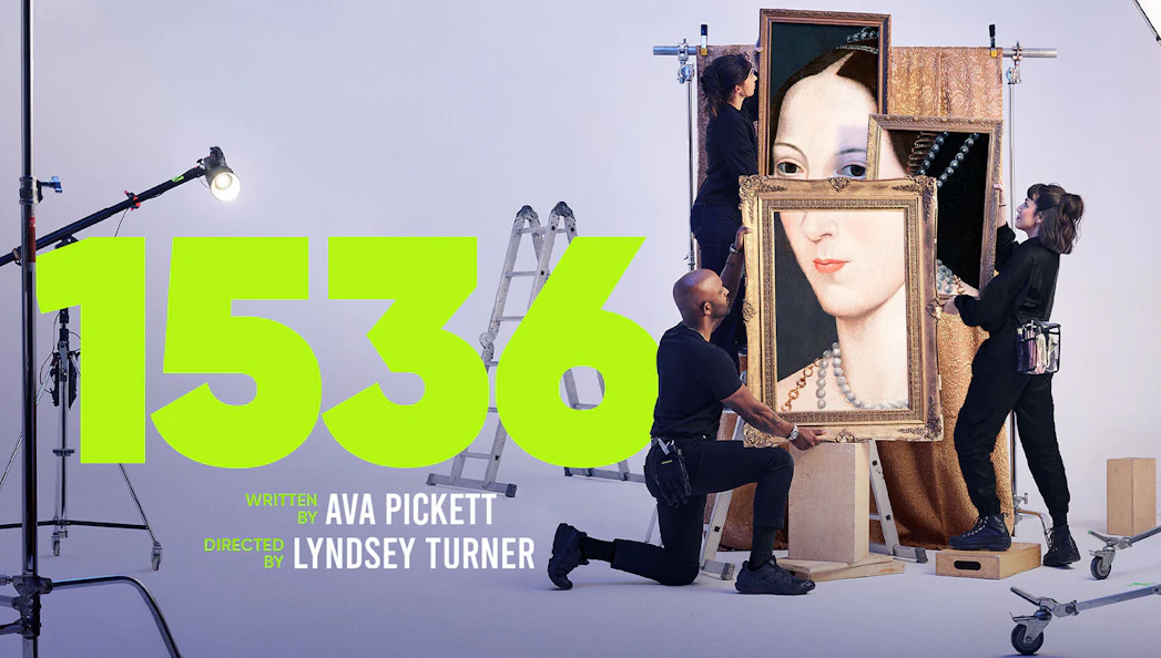 West End show "1536" production setup with crew handling a large portrait.