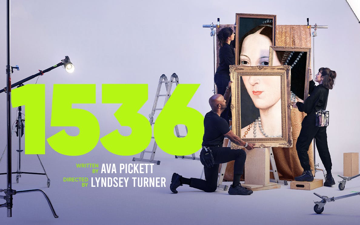 West End show "1536" production setup with crew handling a large portrait.