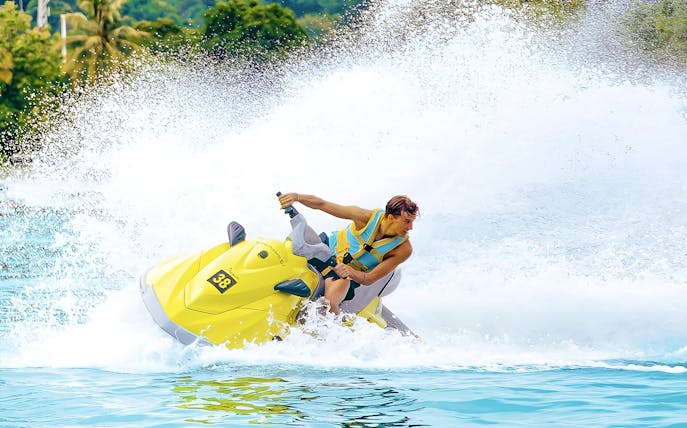 Jet skiing at Paradise 101, Langkawi during a private island adventure.