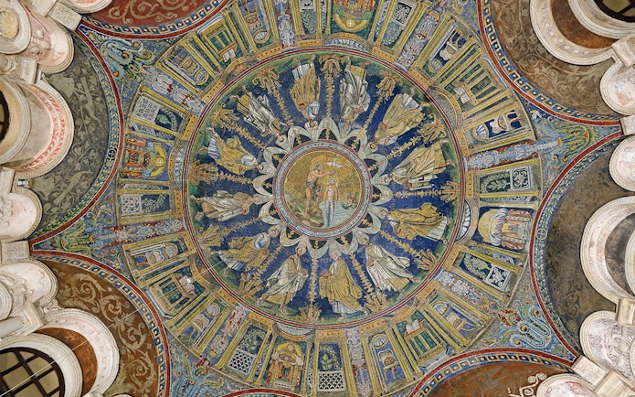 Mosaic ceiling of the Battistero Neoniano in Ravenna depicting religious figures and scenes.