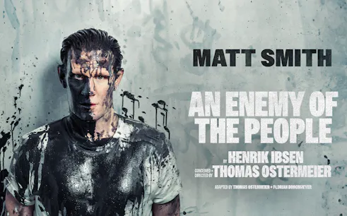 Actor covered in paint for "An Enemy of the People" play poster.