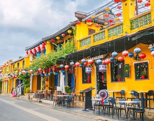 Hoi An's old yellow houses with colorful lanterns and street cafes.
