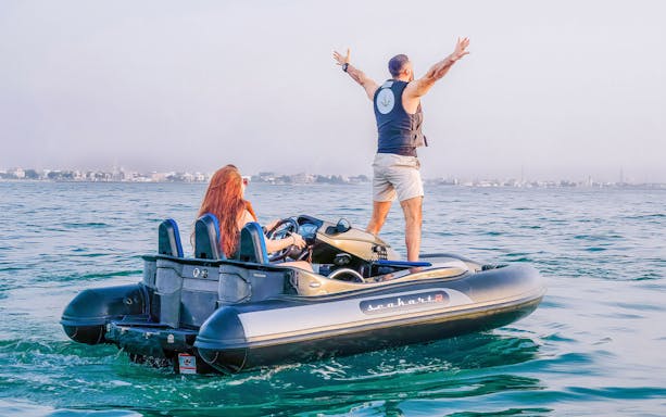 Man and woman enjoying a seakart ride at Adventure Zone Watersports.