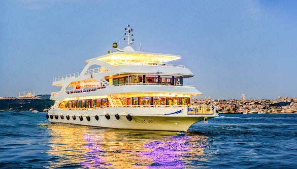 Cruise ship AMOR on Bosphorus strait during evening dinner tour.