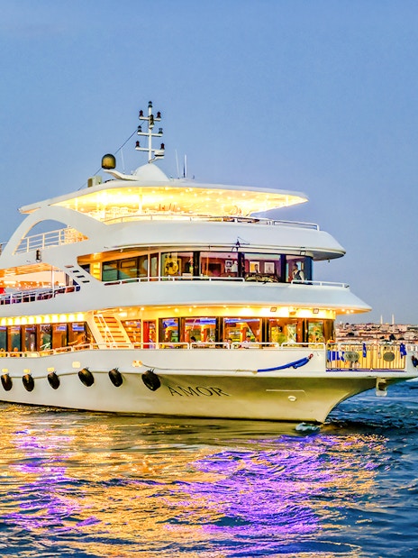 Cruise ship AMOR on Bosphorus strait during evening dinner tour.