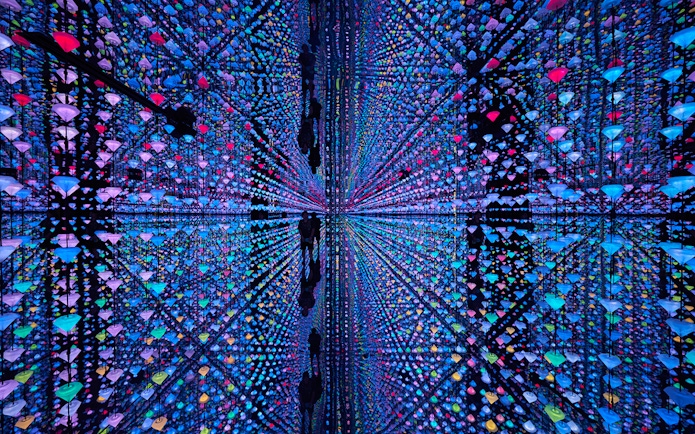 Colorful light installation with reflections at Moco Amsterdam.