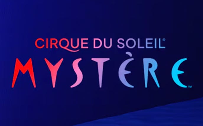 Cirque du Soleil Mystère logo on a dark background.
